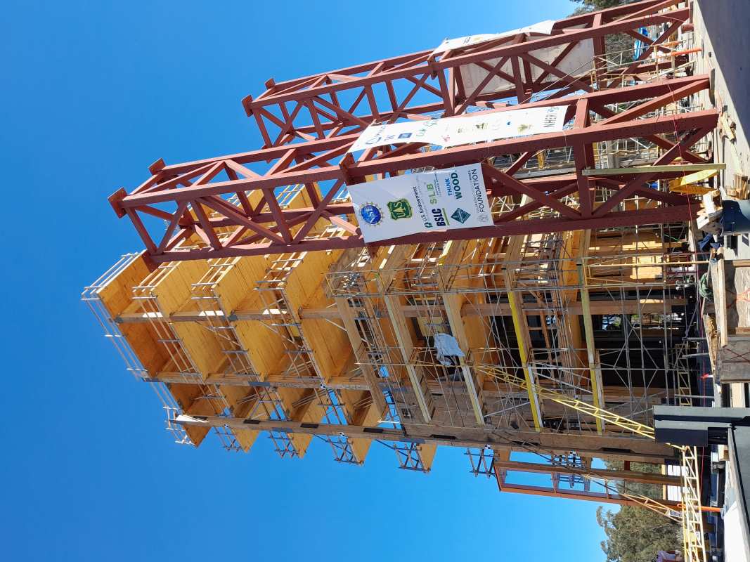 A photo of the 10-story building made of cross-laminated timber under construction in October 2022 (credit Shiling Pei/Colorado School of Mines)