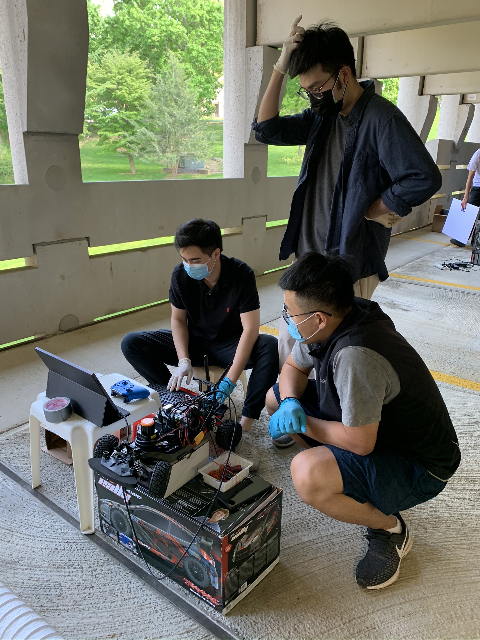 Students working with robotic car