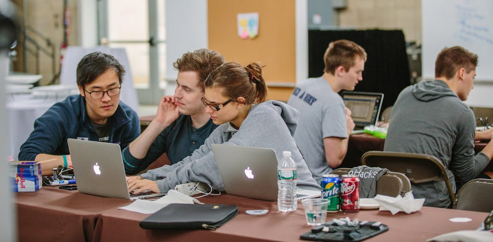 Lehigh University undergraduate students collaborating on a machine learning project in a CSE computer lab.