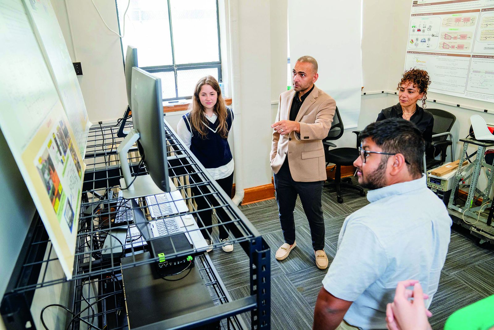 Javad Khazaei and students at the data centre and power systems laboratory at Lehigh