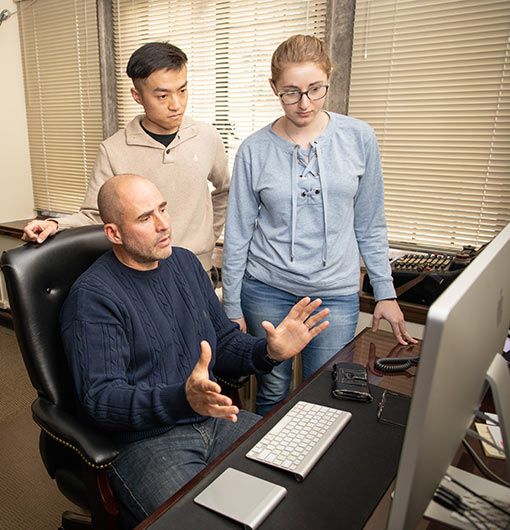 Eugenio Schuster with students