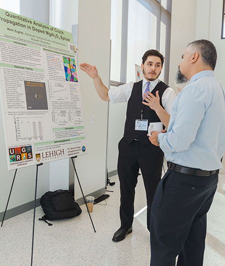 Metri Zughbi presenting a poster