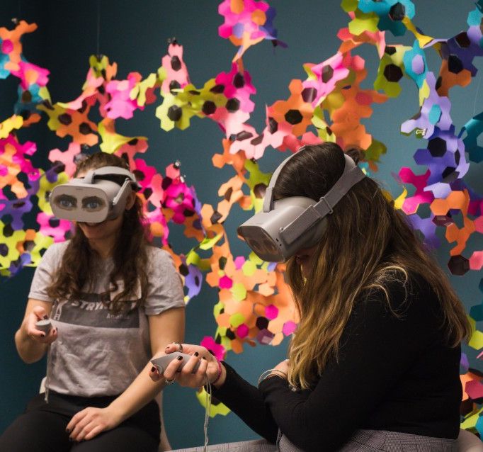 Students wearing VR headsets