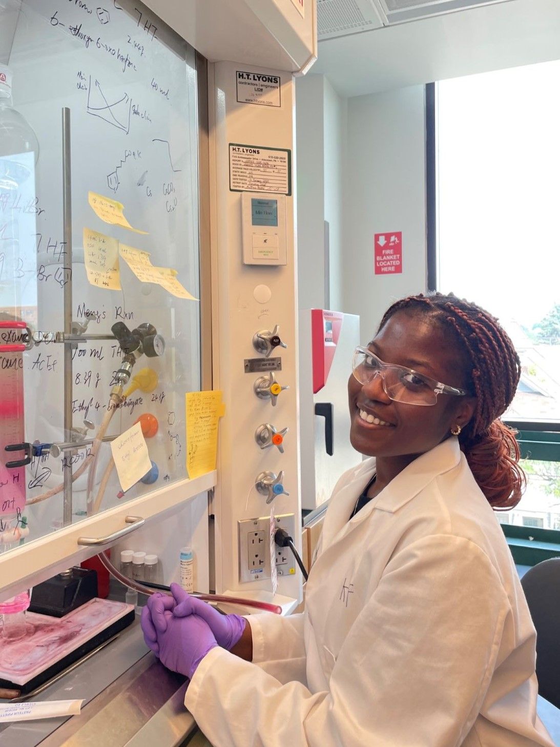 Korka Fall working at lab station with hood