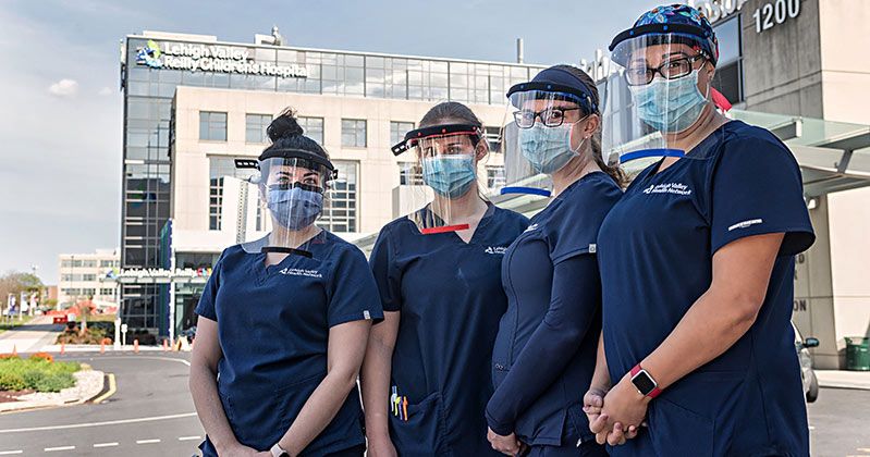LVHN personnel with 3-d printed face shields