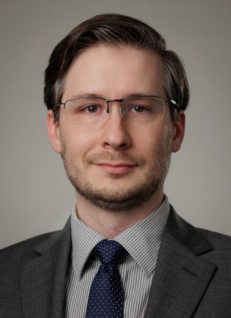 A smiling man.
