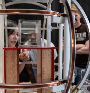 Ebru Demir and students with experimental setup for microswimmers