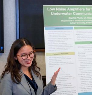 Student presents poster at 2025 symposium