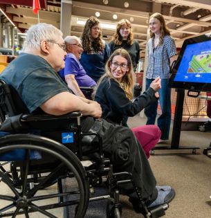 Long-term care residents at Good Shepherd Home – Bethlehem visit Wilbur Powerhouse to test new gaming table