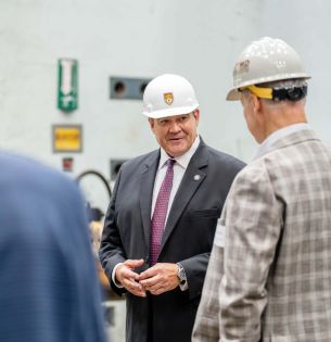 DOE Acting Assistant Secretary Curt Coccodrilli speaks with Lehigh researchers during a tour of the ATLSS Engineering Research Center.