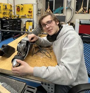 Conner Larocque works on plane in Lehigh's Design Labs