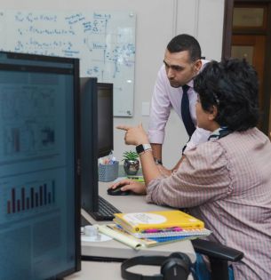 Professor Javad Khazaei and graduate student in lab