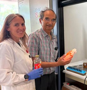 Aitana Tamayo (left) and Himanshu Jain (right) prepare to develop a new demonstration based on candy glass for pre-college students