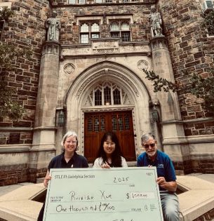 Packard Lab, Professor Natasha Vermaak, PhD student Ruixiao Xue, and STLE member Bill Tuszynski with ceremonial check