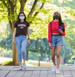 Lehigh students wearing masks while walking on campus