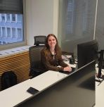 Kaja Skerlj sitting at a desk 