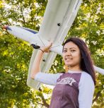 Sae Meh holding a glider