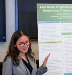 Student presents poster at 2025 symposium