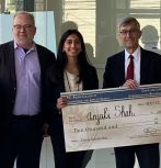 Dean Steve DeWeerth and President Joe Helble present award to Anjali Shah at UGRS 2023