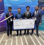 Lehigh University students with large $800 check from The Boeing Company