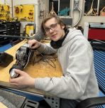 Conner Larocque works on plane in Lehigh's Design Labs