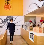 Kevin Takarada ’06G poses for a photo inside a MakiMaki Sushi—a cutting-edge sushi restaurant that stands out in Manhattan’s fast-paced environment. Credit: Rachel Vanni