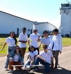 LU Aero outdoor team group shot with plane at 2024 AIAA Design/Build/Fly Flyoff