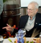 Lee Iacocca '45 speaks with a participant in the Global Village.