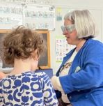 Prof. Vermaak at NCC Reibman Hall Children Center for a career day show-and-tell