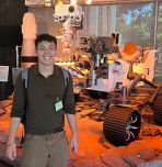 Jack Riffle with Mars Rover model at JPL