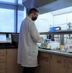 John Tolbert working in lab