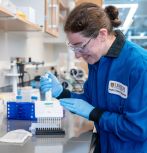 Whitney Blocher McTigue in lab