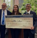 Dean Steve DeWeerth, Isabella Federico, and President Joe Helble during the award ceremony