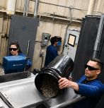 Left: gasifier setup; right: LIBS laser analyzing the feedstock