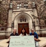 Packard Lab, Professor Natasha Vermaak, PhD student Ruixiao Xue, and STLE member Bill Tuszynski with ceremonial check