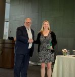 Dean Steve DeWeerth presents a Rossin Award to Professor Angela Brown