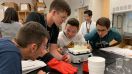 SEI students doing experiment