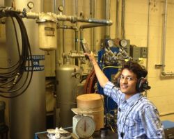 student conducting site visit